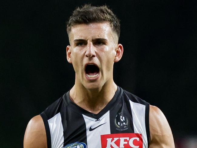 GOLD COAST, AUSTRALIA - JUNE 29: Nick Daicos of the Magpies celebrates a goal during the 2024 AFL Round 16 match between the Gold Coast SUNS and the Collingwood Magpies at People First Stadium on June 29, 2024 in Gold Coast, Australia. (Photo by Russell Freeman/AFL Photos via Getty Images)