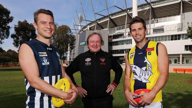 Kevin Sheedy with Jason Davenport (left) of the Geelong Netball football league and Rikki Johnston (right) of the Mornington Peninsula Nepean football league who will play in the curtain raiser to the round 8 Country Game between Essendon and Geelong at the MCG. Pic: Michael Klein