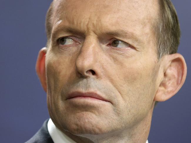 FILE - In this Sept. 19, 2014, file photo, former Australian Prime Minister Tony Abbott speaks during a press conference, in Sydney.  Australia's Prime Minister Malcolm Turnbull  confirmed Friday, Aug. 25, 2017,  that his predecessor and intra-party rival Abbott had once been too drunk to vote in Parliament, an incident that's been a poorly kept secret in political circles for eight years.(AP Photo/Rick Rycroft, File)