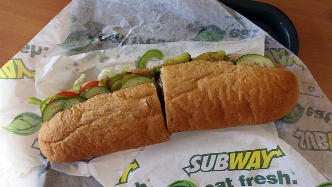 MIAMI, FL - OCTOBER 21: A Subway sandwich is seen in a restaurant as the company announced a settlement over a class-action lawsuit that alleged that Subway engaged in deceptive marketing for its 6-inch and 12-inch sandwiches and served customers less food than they were paying for on October 21, 2015 in Miami, Florida. While it denies the claims, Subway said that franchisees would be required to have a measurement tool in stores to make sure loaves are 12-inches. Joe Raedle/Getty Images/AFP == FOR NEWSPAPERS, INTERNET, TELCOS & TELEVISION USE ONLY ==