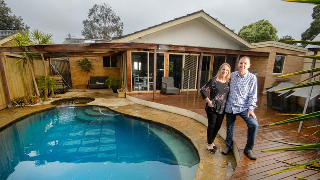 Greg and Danielle Clarke at their house in Cheltenham, which offers plenty of lifestyle perks. Picture: Jay Town