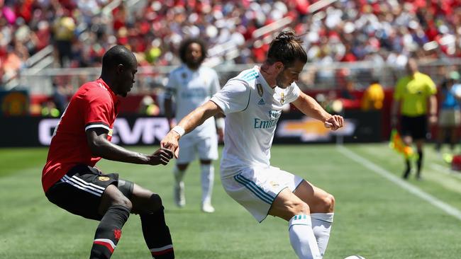 Gareth Bale #11 of Real Madrid controls the ball in front of Eric Bailly #3 of Manchester United