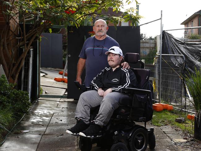 Pictured at Maroubra in Sydney is David McIntyre and Hayden Alexander. David owns a house next door to a construction site where Hayden lives. Picture: Richard Dobson