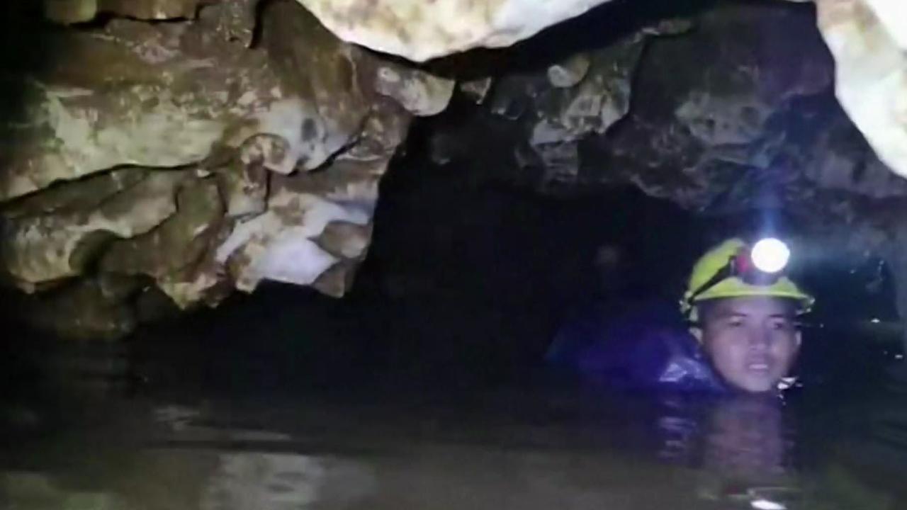 Thai navy seals divers seen traversing the cramped cave system in Tham Luang cave at the Khun Nam Nang Non Forest Park in Mae Sai district of Chiang Rai province, Thailand.