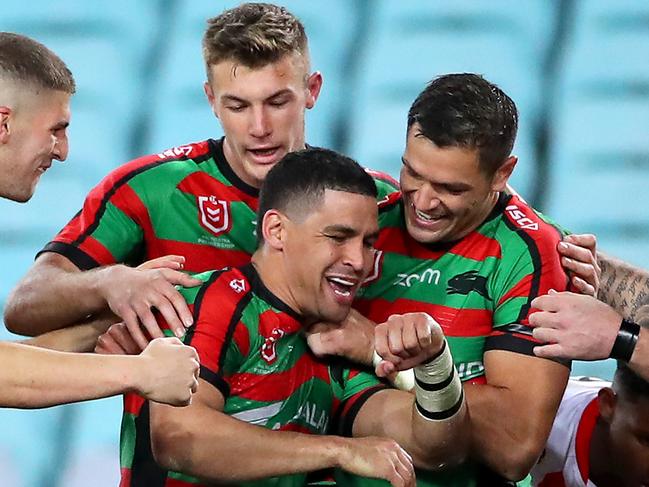 SYDNEY, AUSTRALIA - JULY 26: Cody Walker of the Rabbitohs celebrates scoring a try with team mates during the round 19 NRL match between the South Sydney Rabbitohs and the St George Illawarra Dragons at ANZ Stadium on July 26, 2019 in Sydney, Australia. (Photo by Cameron Spencer/Getty Images)