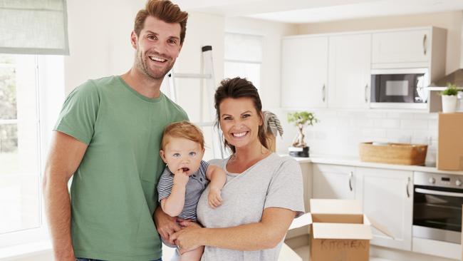 A young couple have just moved into the first home and have signed up to a new mortgage. Picture: iStock.