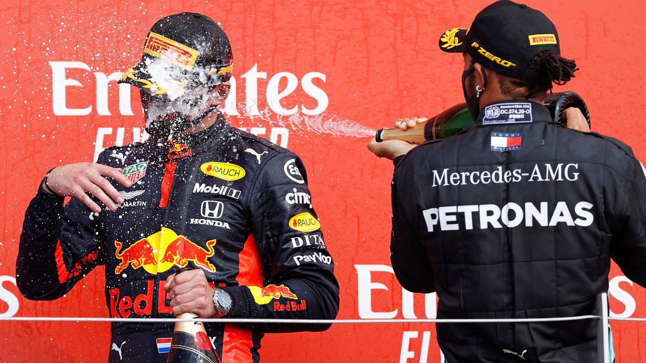 Hamilton would’ve taken great delight spraying Max Verstappen on the podium at the 2020 British Grand Prix. They pair duelled on the track for many years. Photo: Andrew Boyers/AFP