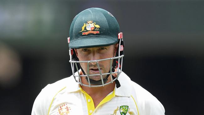 ADELAIDE, AUSTRALIA - DECEMBER 07: Shaun Marsh of Australia walks off the field after being dismissed by Ravichandran Ashwin of India during day two of the First Test match in the series between Australia and India at Adelaide Oval on December 07, 2018 in Adelaide, Australia. (Photo by Quinn Rooney/Getty Images)