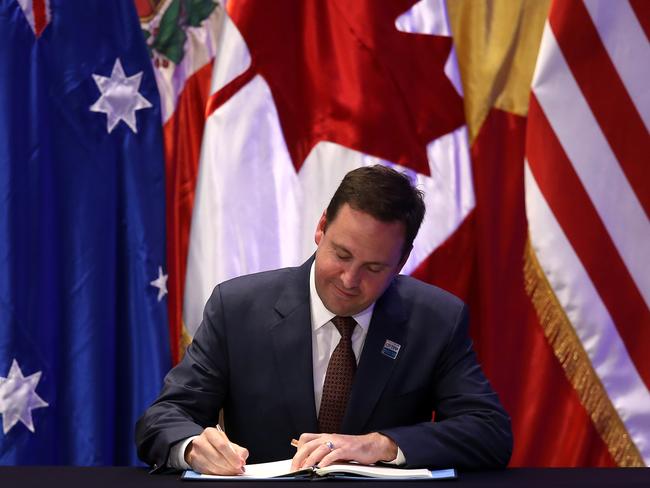 Australia's Trade Minister Steven Ciobo signs the rebranded 11-nation Pacific trade pact this week which allows the partners to push forward with economic integration in the face of greater US protectionism. Picture: AFP/Claudio Reyes