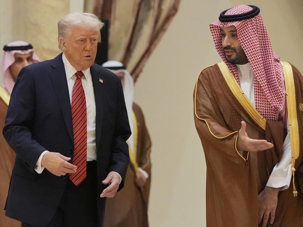 President Donald Trump arrives with Saudi Crown Prince Mohammed bin Salman. Picture: AP Photo/Alex Brandon