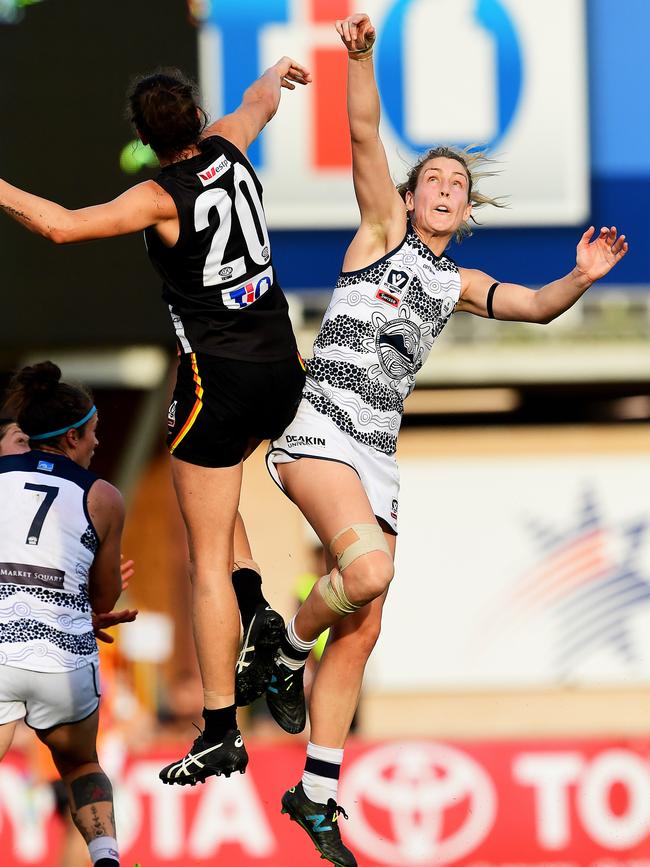 NT Thunder’s Jasmyn Hewett, who will line up for the Crows on Saturday, competes with Geelong’s Madaleine McMahon in a VFLW match in Darwin. Picture: Justin Kennedy