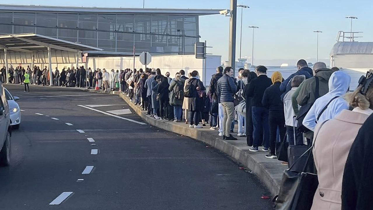 Queues extending outside the main terminals at Sydney airport.