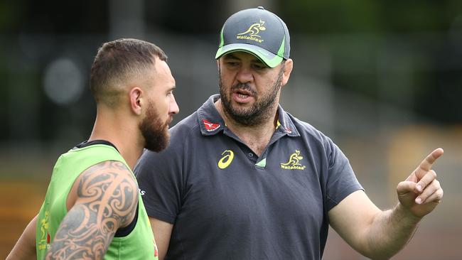 Wallabies coach Michael Cheika talks to Quade Cooper at Leichhardt Oval.