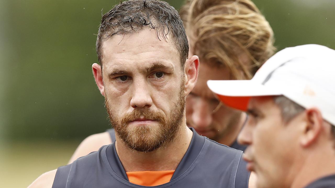 SYDNEY, AUSTRALIA - FEBRUARY 22: Shane Mumford of the Giants listens to Leon Cameron, coach of the Giants, during the AFL pre-season practice match between the Greater Western Sydney Giants and the Sydney Swans at Blacktown International Sportspark on February 22, 2019 in Sydney, Australia. (Photo by Ryan Pierse/Getty Images)