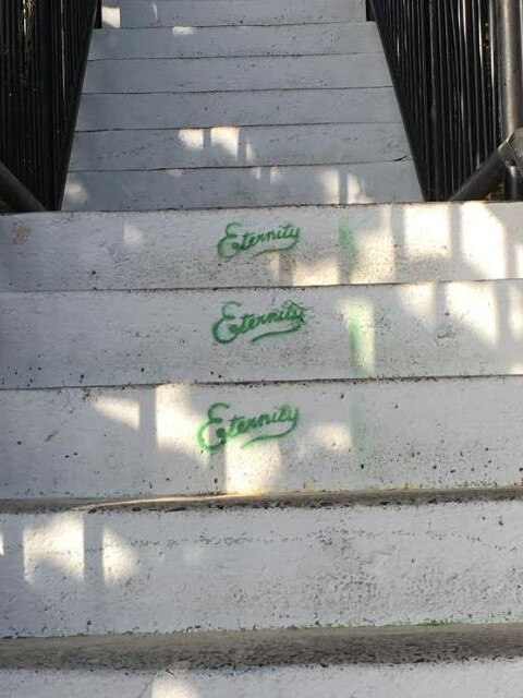 The North Burleigh Lookout and Miami stairs have been spray painted with the words "Eternity" since the rainbow stairs were painted over by council. 