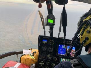 The Westpac Lifesaver Rescue Helicopter helping with the search.