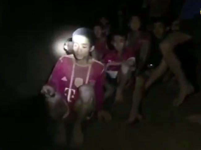 The boys and their soccer coach as they are found in a cave. Picture: Thai Navy Seal via AP