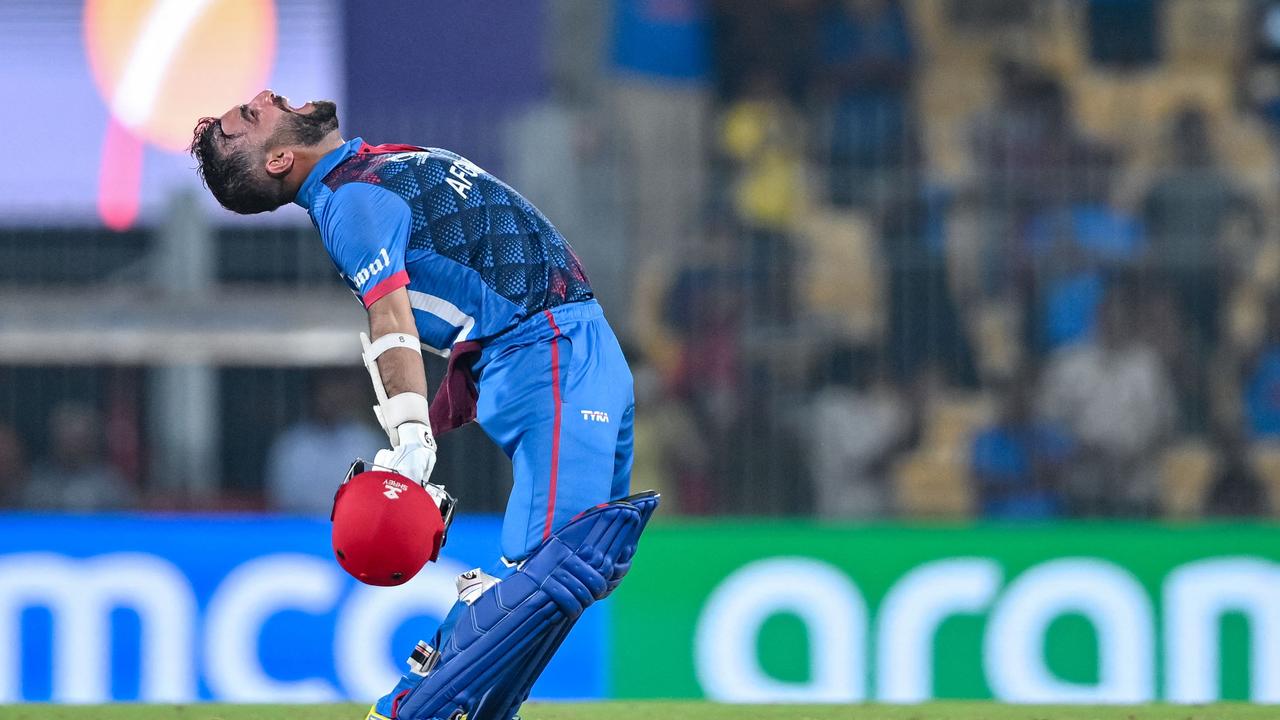 Afghanistan's captain Hashmatullah Shahidi celebrates after defeating Pakistan. (Photo by R.Satish BABU / AFP)