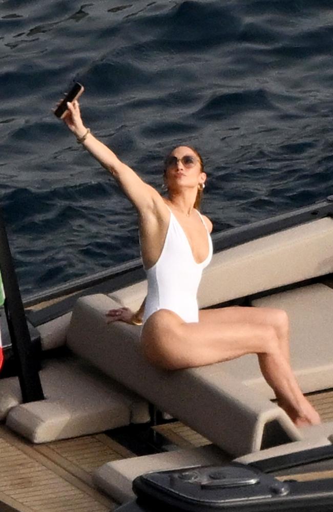 Jennifer Lopez was spotted having fun on the boat while snapping some selfies. Picture: Backgrid.