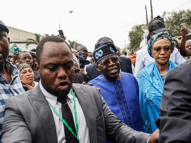 Oluremi Tinubu with husband Bola Tinubu, did not hold back in her speech. Picture: AFP
