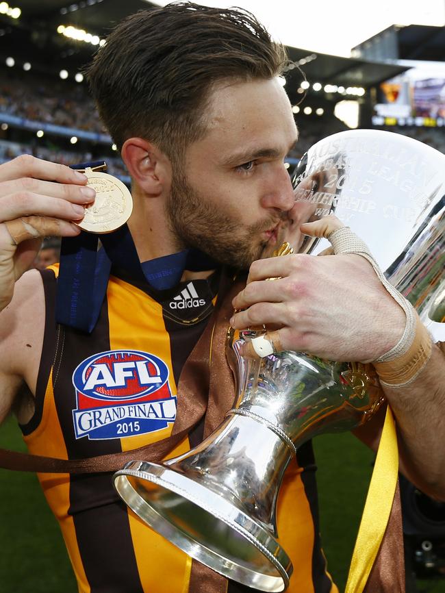 Hawthorn’s Jack Gunston kisses the 2015 Premiership Cup. Picture: Michael Klein.