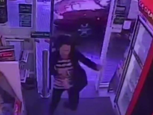 People run inside a convenience store as the driver tears past them.
