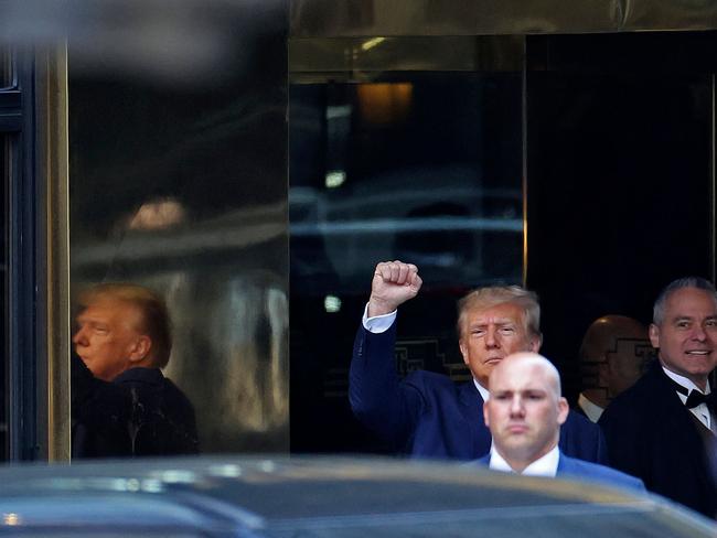 Donald Trump salutes supporters as he exited Trump Tower in New York. Picture: Getty Images via AFP