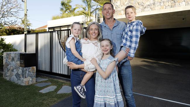 Ben and Kirsty, with children Isla, Evie and Max, have put their Brisbane Corso home on the market. Picture: Josh Woning