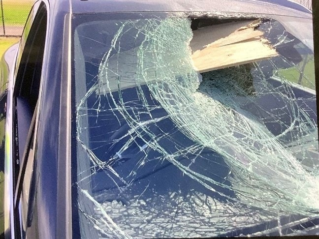 The 71-year-old driver from Malvern and his passenger, a 70-year-old Malvern woman, were travelling at 80km/h in their Porsche Macan SUV between Brunswick and Moreland Roads on 20 September about 10am when the piece of wood struck their vehicle. Picture: Victoria Police