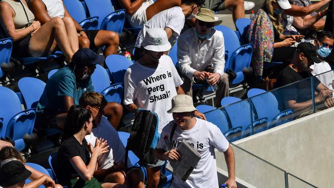 Spectators wearing "Where is Peng Shuai?" T-shirts in the stands on day nine of the Australian Open tennis tournament in Melbourne. Picture: AFP