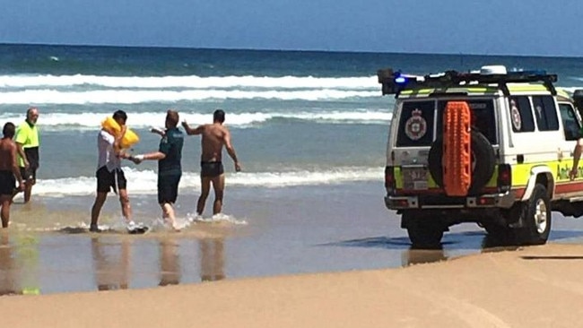 One of the crash survivors arriving ashore on Fraser Island. Facebook: Fifty shades of Fraser Island