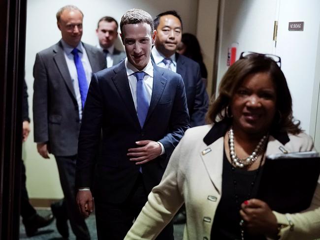 Facebook co-founder, Chairman and CEO Mark Zuckerberg leaves after he testified before a combined Senate Judiciary and Commerce committee hearing in the Hart Senate Office Building on Capitol Hill.