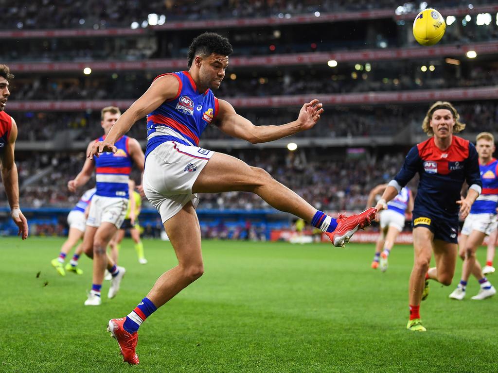 Jason Johannisen gets the ball away. Picture: Daniel Carson/AFL Photos via Getty Images