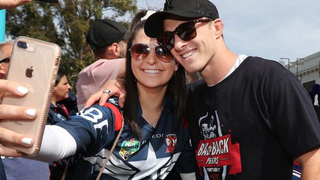 A fan grabs a selfie with Sam Verrills. Picture: Richard Dobson