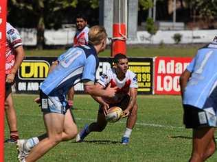 ON THE BALL: South Grafton Rebels Kieron Johnson-Heron gets a pass away at the Hoey Moey Tooheys Coffs Coast 9s on Saturday. Picture: Sam Flanagan