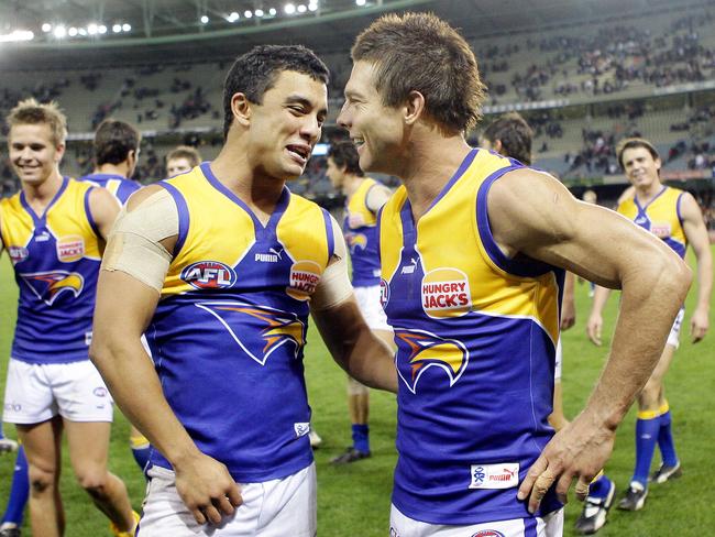 Daniel Kerr and Ben Cousins playing for the Eagles.