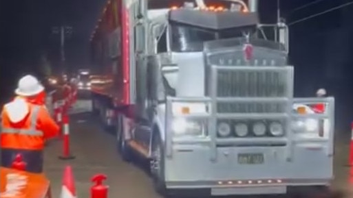 The first truck rolls across the Ollera Creek bridge overnight. Picture: Supplied