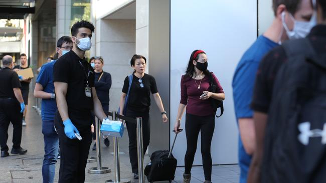 People queue to enter the Apple Store in Bondi Junction. Picture; Britta Campion.