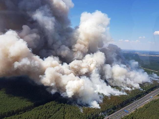 A forest is burning near the highway A9 between Potsdam and Fichtenwalde, eastern Germany. Picture: AP