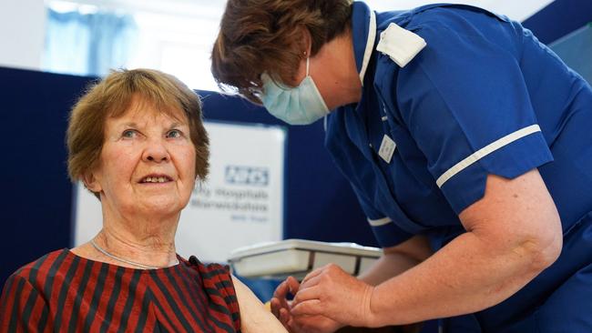 Margaret Keenan, 91, receives her spring Covid-19 booster shot at University Hospital Coventry, on April 22, 2022. (Photo by Jacob King / POOL / AFP)