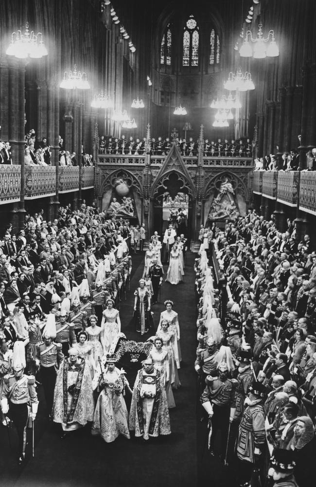 Queen Elizabeth II walks down the nave in Westminster Abbey after being crowned during her Coronation ceremony. Picture: Getty