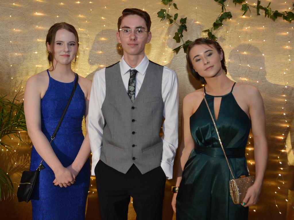 Taylor Clark, Kylah Quaife and Timothy Burton at the Toowoomba State High School Formal, November 13, 2024.