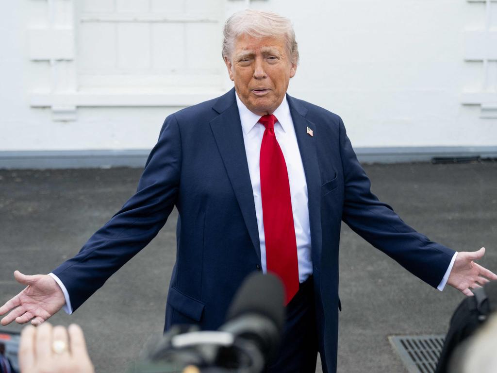 US President Donald Trump speaks with reporters outside the White House in Washington, DC. (Photo by SAUL LOEB / AFP)