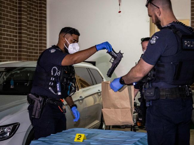 Police find an imitation firearm during a raid in Cranbourne. Picture: Jake Nowakowski