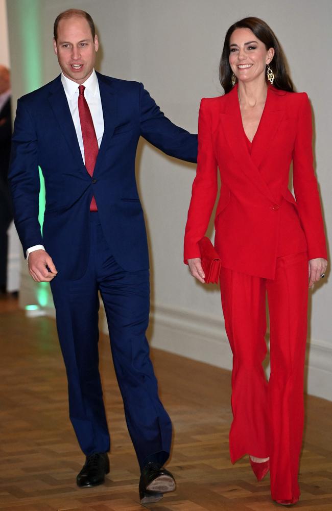 Catherine’s stylish red power suit was similar to an outfit worn by Meghan Markle last year. Picture: AFP