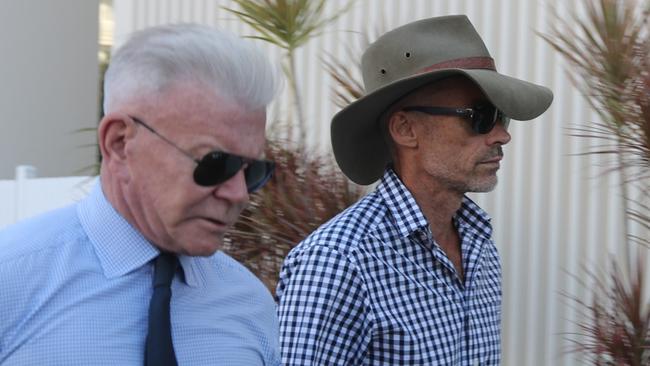 Former Darwin City Councillor Paul Arnold with his barrister Jon Tippett going into Darwin Local Court to face stalking and domestic violence related charges on Monday, May 20. Picture: Zizi Averill