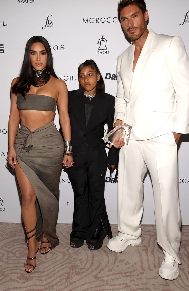 Kim Kardashian, North West, and Chris Appleton. Picture: Tommaso Boddi/Getty Images for FIJI Water