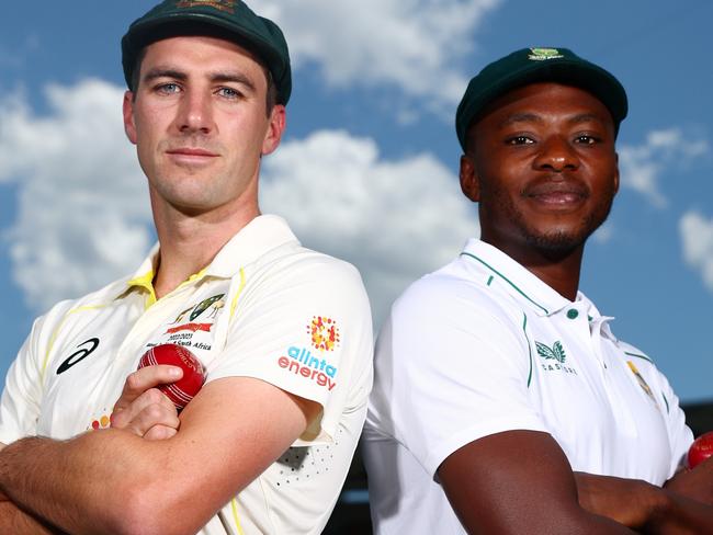 BRISBANE, AUSTRALIA - DECEMBER 16: Pat Cummins of Australia and Kagiso Rabada of South Africa pose at The Gabba on December 16, 2022 in Brisbane, Australia. (Photo by Chris Hyde/Getty Images)
