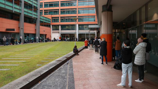 People queuing outside Sydney Passport Office. Picture: Justin Lloyd.