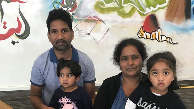 family portrait of Sri Lankan Tamils Priya and Nadesalingam and their two Australian-born children  Kopika and Tharunicaa (L) Nadesalingam.